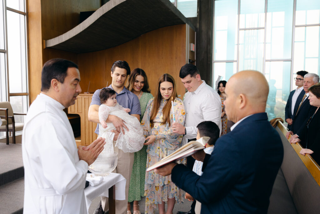 Family gathered during private baptism at Christ Cathedral Tower of Hope