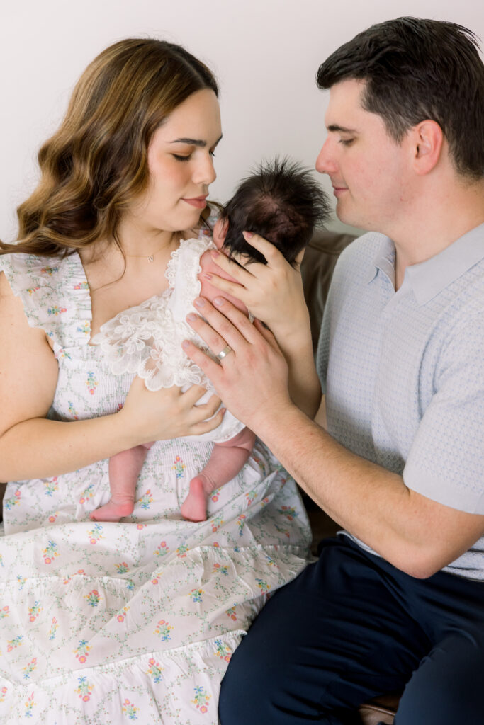 mother and father soothing baby